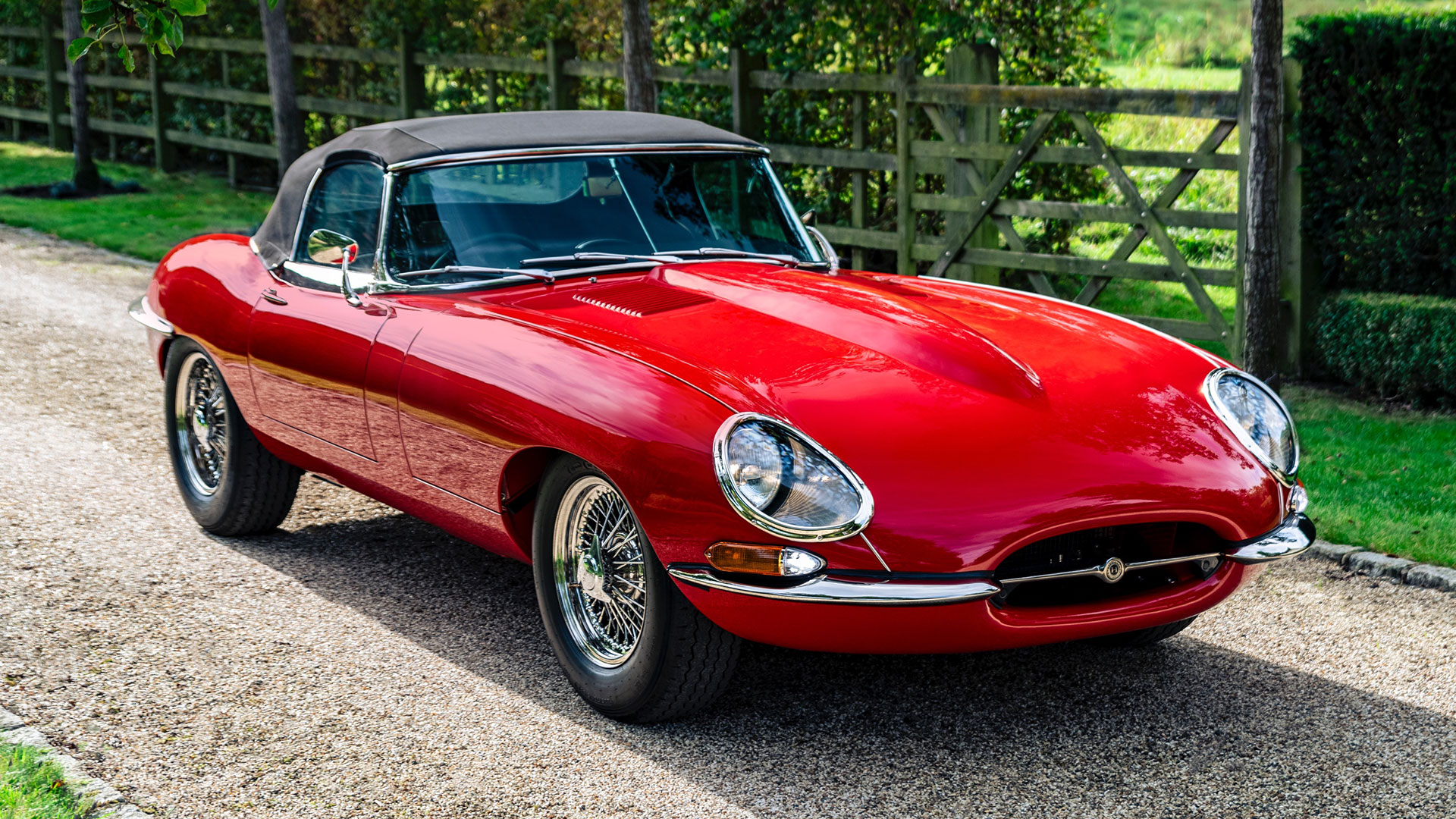 Helm modified E-Type Jaguar in red (front three quarter shot)