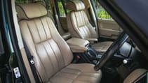 Interior front seat shot of Queen Elizabeth's 2004 Range Rover