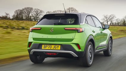 Driving shot of green Vauxhall Mokka