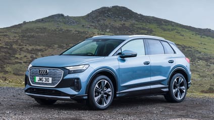 Static shot of the Audi Q4 e-tron with green hills in backdrop