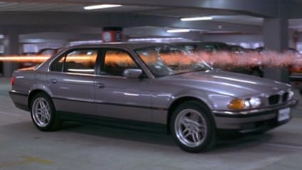 1997 BMW 750iL [E38] driving out of underground car park while being shot at in movieTomorrow Never Dies (1997)