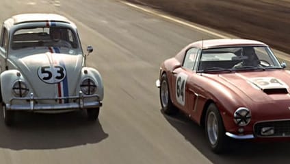 VW Beetle with number 53 on bonnet racing another car as Herbie in 1968 The Love Bug movie