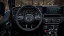 Interior shot of the 2024 Jeep Wrangler 4xe cockpit