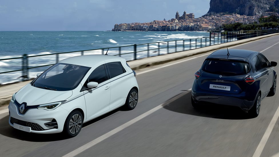 Two Renault Zoes passing each other on the coastal road along the French riviera