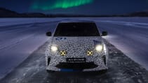 Alpine A290 head on static shot in dark with Aurora Borealis in backdrop