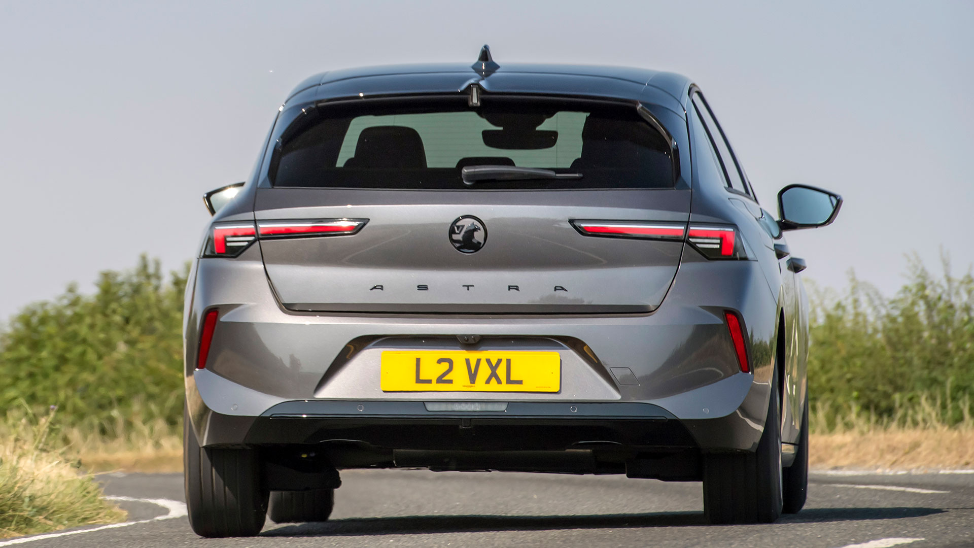 Driving shot of the Vauxhall Astra hybrid, from rear