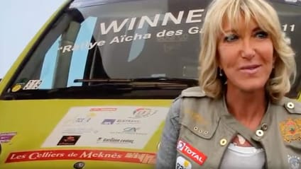 Still of Dominique Serra giving an interview at the Rallye Aicha du Gazelle 2012