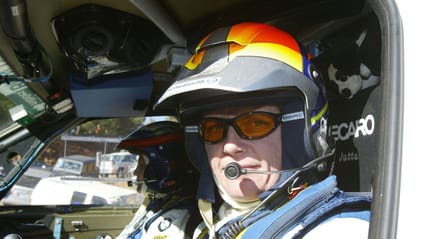 Shot of Jutta Kleinschmidt piloting her Dakar entry