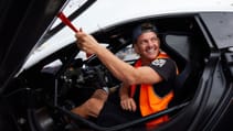 Close up of Mad Mike Whiddett in the driver's seat of his modified Lambo Huracan