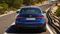 2024 BMW M440i refresh, exterior driving shot from rear dead on