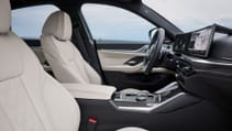 2024 BMW M440i refresh, interior shot of front seats taken from passenger side looking at driver side