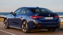 2024 BMW M440i refresh, driving three quarter shot from rear