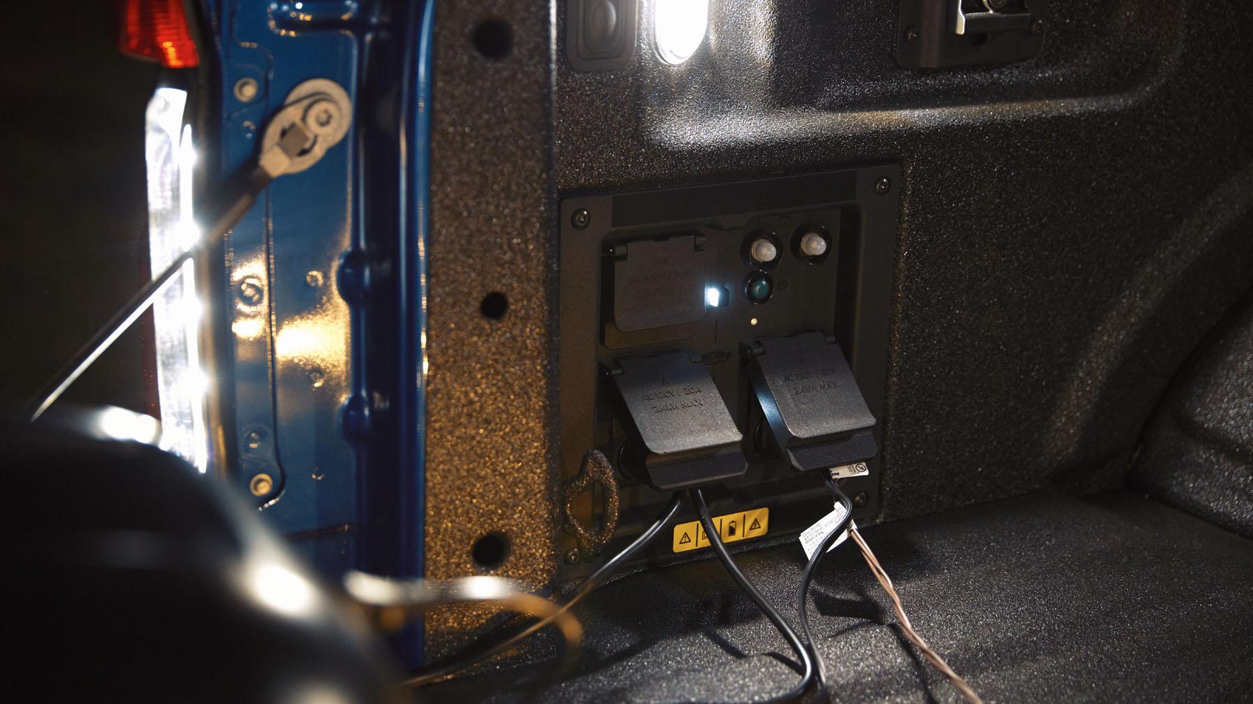 Close up shot of power outlets in back of Ford F-150 Lightning