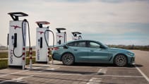 2024 BMW i4 refresh, parked shot showing car charging at Ionity stations