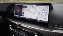 2024 BMW i4 refresh, close up of BMW Curved display with infotainment