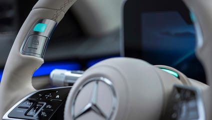 Close up of a button on a Merc steering wheel which enables autonomous mode