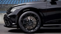 The 2024 Golf R Black Edition static profile close-up of front end and wheel