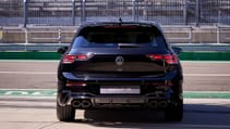 The 2024 Golf R Black Edition on track pit lane, dead-on rear