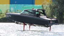 The Candela C-8 DC on water with hydrofoils deployed