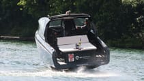 The Candela C-8 DC on water about to 'fly' from powerboat to hydrofoil mode