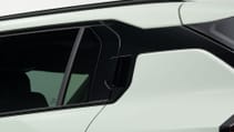 Kia EV3 - close up of exterior gloss trim and privacy glass