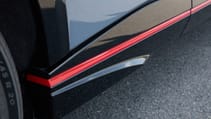 Nissan Ariya Nismo red detailing