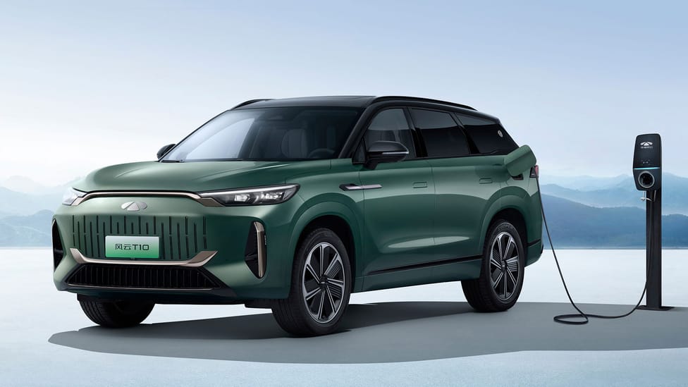 Static shot of Chery's Fulwin T10 PHEV SUV connected to an EV charge point