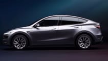 Static side-profile shot of the 2025 Tesla Model Y Juniper