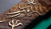  The in-laid dragon marquetry in-laid on the wooden trim of the Rolls Royce Phantom Dragon