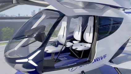 Close up of interior of SkyDrive flying car with two passenger seats and one pilot seat