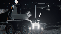 Digital render of Venturi Mona Luna moon rover on moon with headlights on