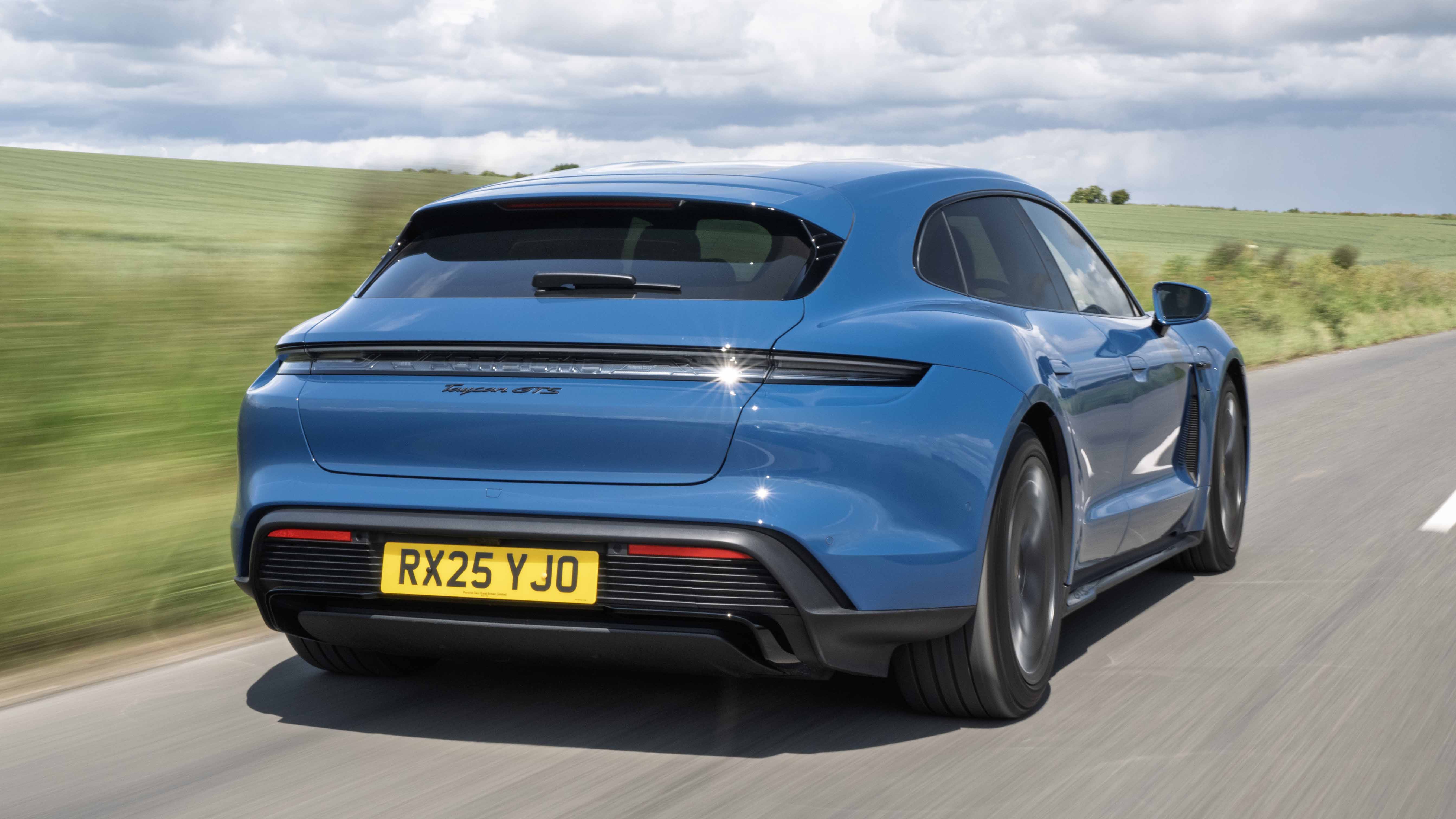 Porsche Taycan Sport Turismo exterior rear three quarter dynamic