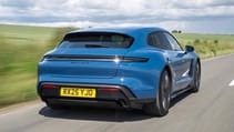 Porsche Taycan Sport Turismo exterior rear three quarter dynamic