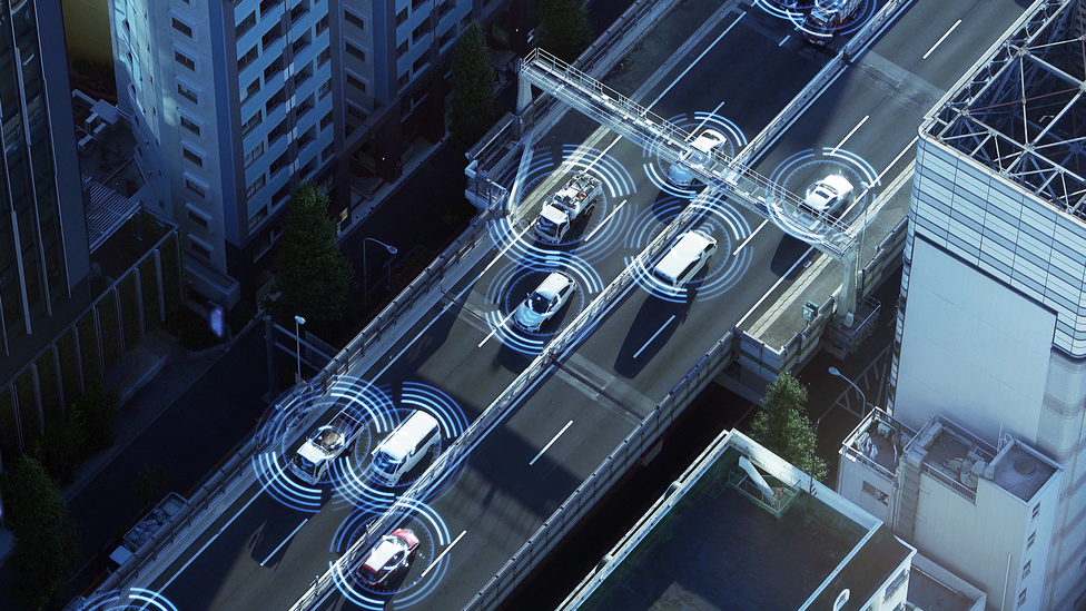 Graphic of birds eye view of cars on a motorway with sensor fields around them