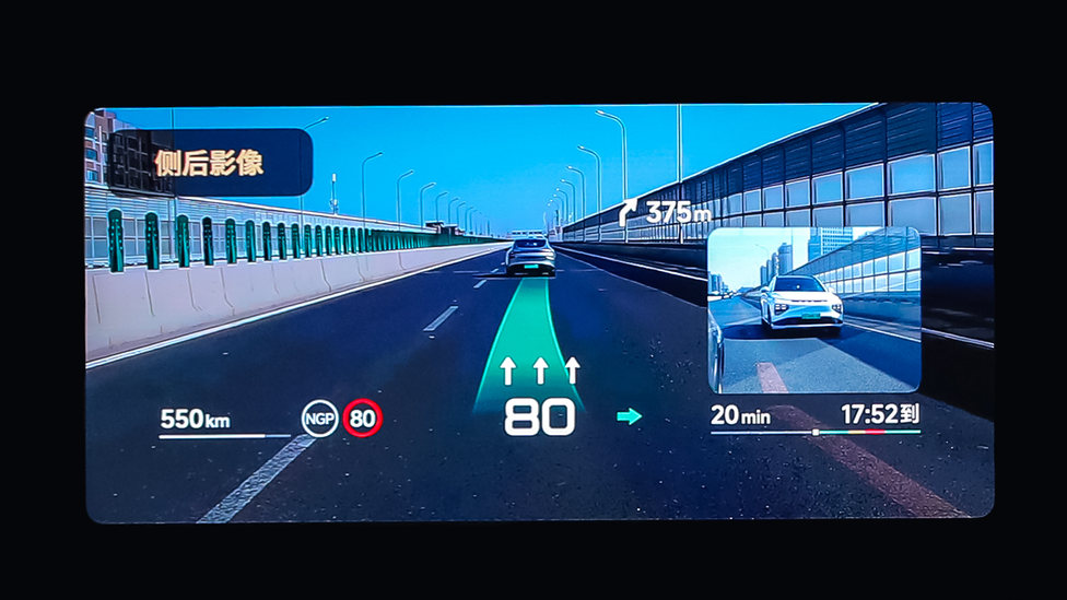 Screenshot from Xpeng presentation showing augmented reality over windscreen head-up display