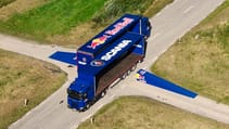 Red Bull Scania moving trucks stunt bike jump