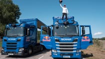 Red Bull Scania moving trucks stunt bike jump