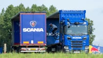 Red Bull Scania moving trucks stunt bike jump