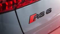 A close-up of the rear badge detail on an Audi RS
