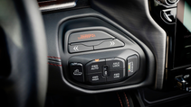 Close up of a Ram TRX interior with Drive Modes, 4WD and Axle Lock buttons.