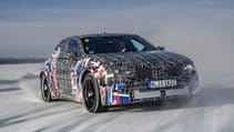 BMW M Neue Klasse driving at speed on a frosty road.