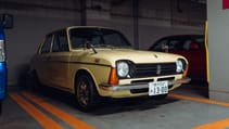 Meet the man whose 50-car collection of old Subarus is stored in an underground car park in Japan