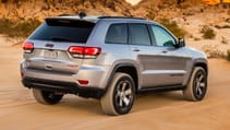 2017-jeep-grand-cherokee-trailhawk-rear-three-quarter-in-motion.jpg