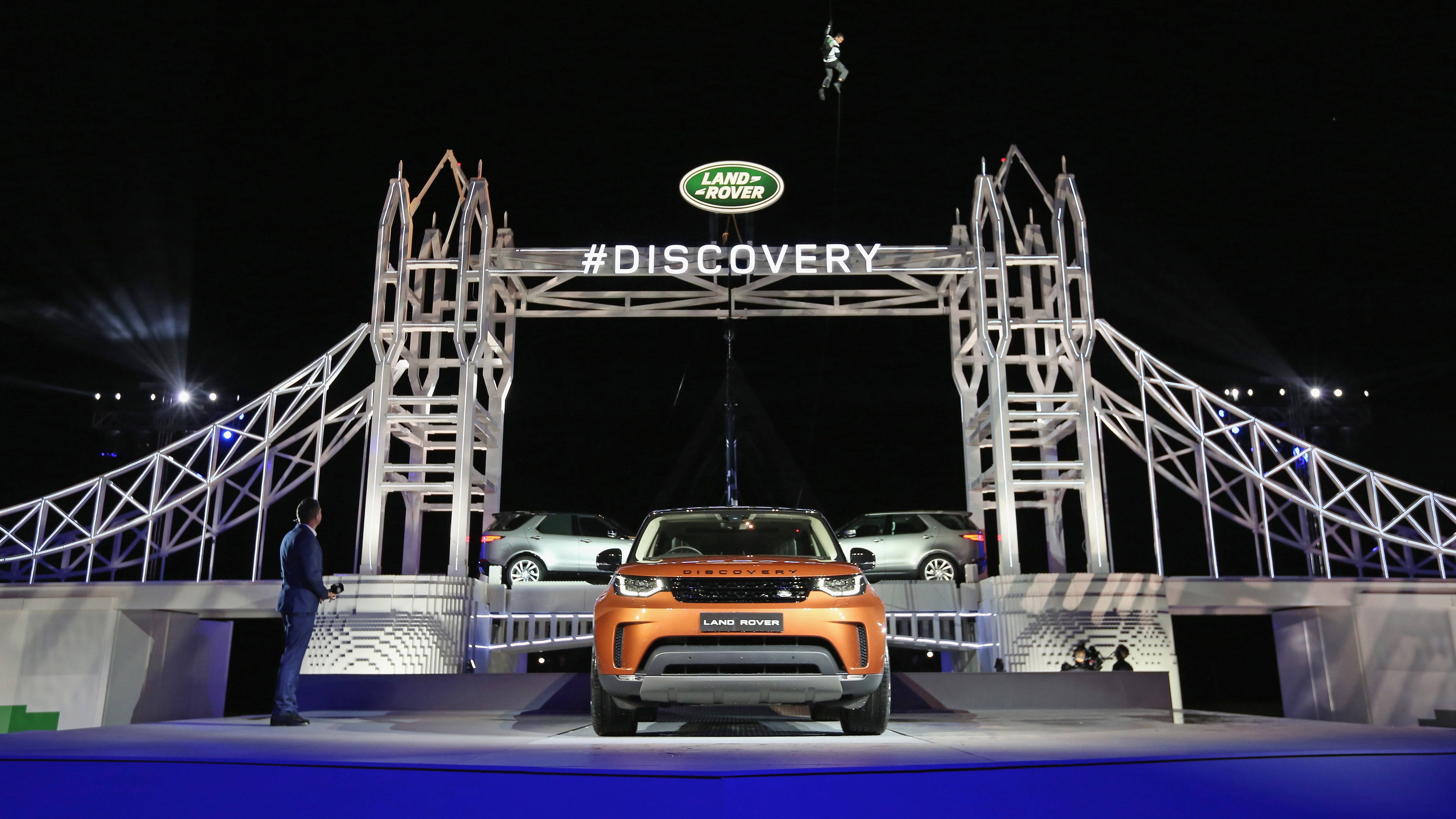 bear_grylls_rapels_from_a_helicopter_as_he_arrives_at_the_global_unveiling_of_the_new_land_rover_discovery_at_packington_hall_solihull_uk.jpg