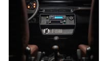 expedition-motor-company-silver-wolf-interior-center-console-black-background.jpg