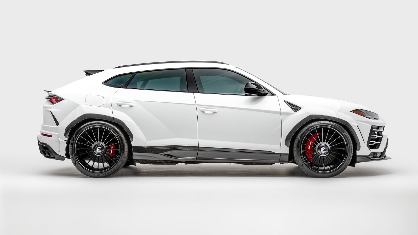 1016-industries-lamborghini-urus-widebody-white-side-view.jpg