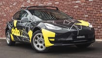 delta4x4_tesla_model3_brickwall.jpg