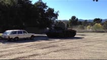 Arnold Schwarzenegger Crushes A Car With His Tank