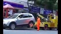 Shanghai Lady Drives Off With Tow Truck