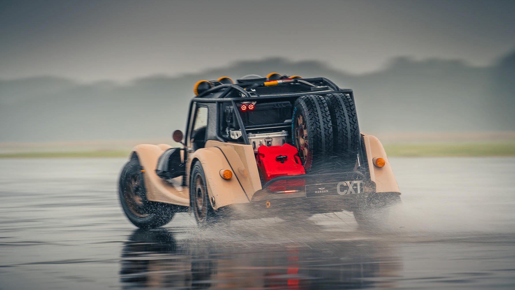 Morgan CX-T on wet racetrack